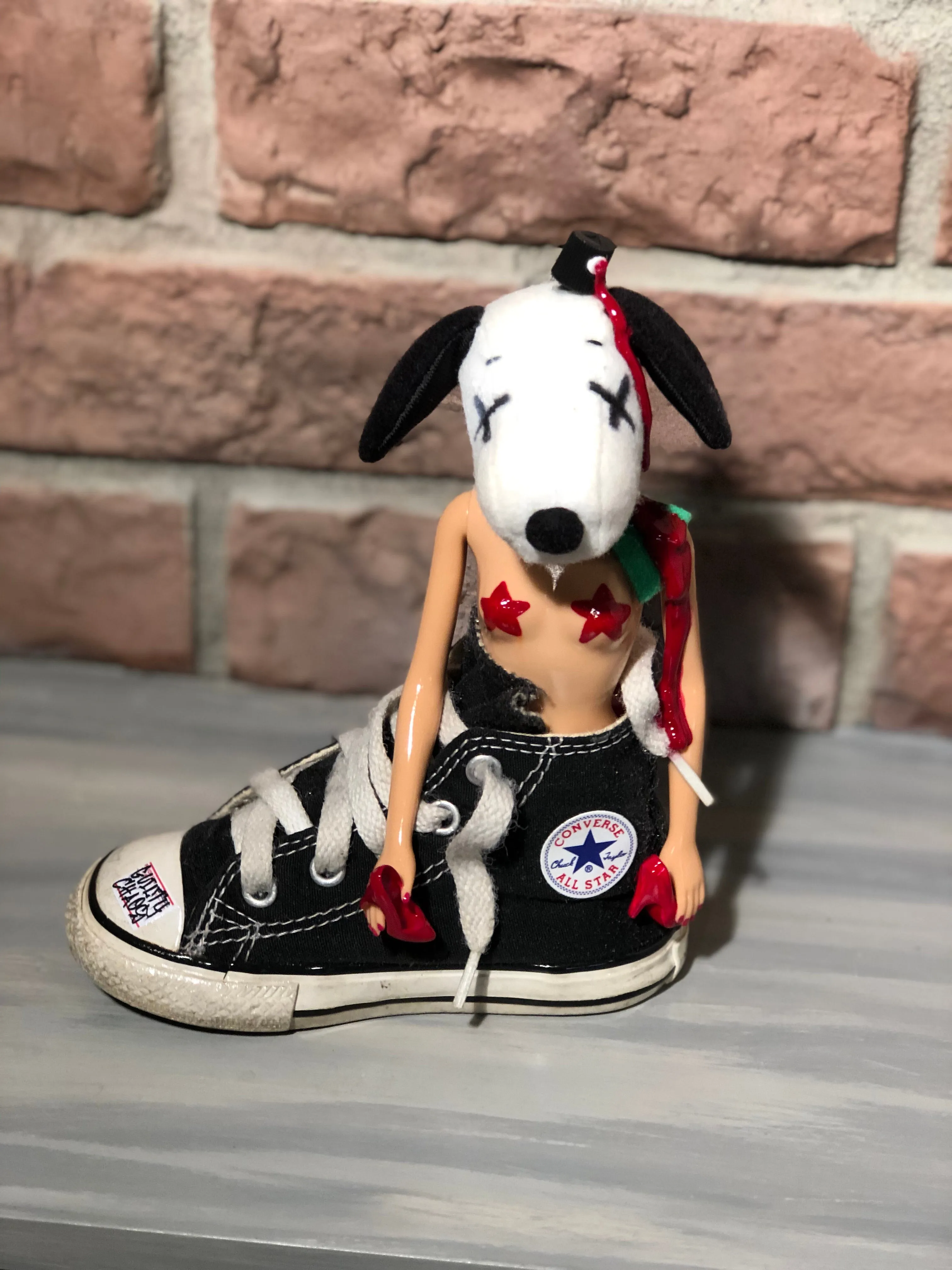 Kaws Snoopy can rock chucks or heels