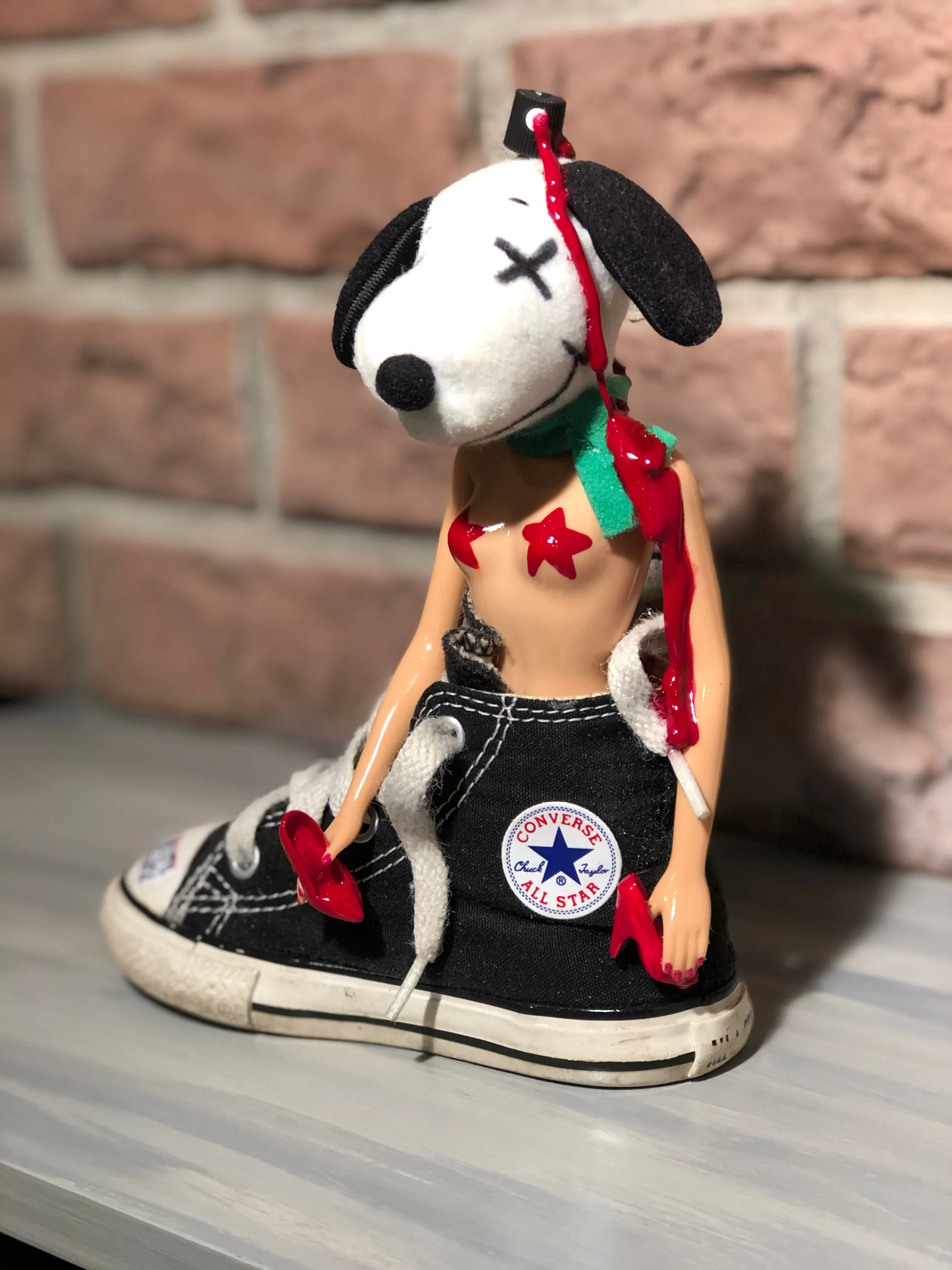 Kaws Snoopy can rock chucks or heels